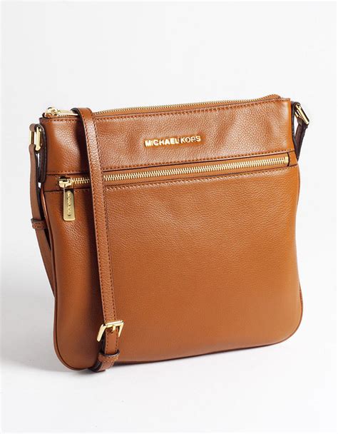 michael kors brown cross bag|michael kors brown leather backpack.